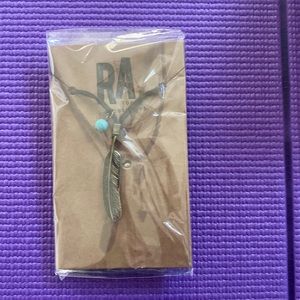 Necklace, innersense sample & novelty pin